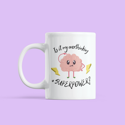 White mug with a cartoon brain and humorous text on a light purple background